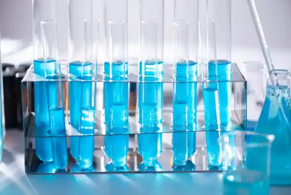 Student conducting chemistry experiment in laboratory